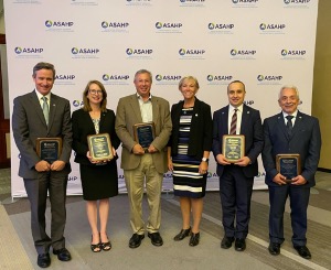 ASAHP Fellows standing in a line from left to right - Dr. David Henzi ;  Dr. Susan Gordon-Hickey,  Dr. David Brown, ASAHP President  Dr. Deb Larsen,  Dr. Fevzi Akinci,  Dr. Jesús García-Martínez